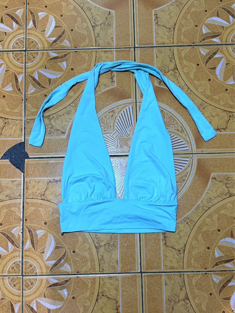 Teal halter top brand new (Category: Sleeveless) located in Taguig. Submitted by tiffanyshane (Listing ID 1460924782, Image 1). Description: never nagamit .