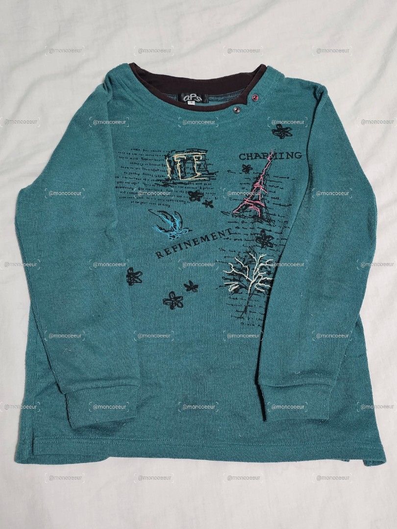 teal long sleeve sweater with graphic (Category: Coats, Jackets and Outerwear) located in Guinobatan. Submitted by moncoeeur (Listing ID 1461095542, Image 1). Description: — size small on tag but fits until medium — features eiffel tower graphic print.