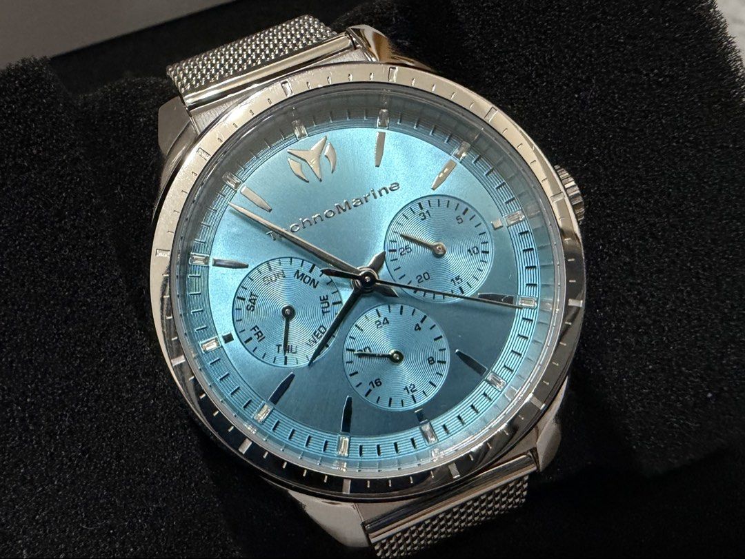 TechnoMarine Watch - Blue Dial (Category: Luxury Watches) located in Manila. Submitted by bravewolf-126304 (Listing ID 1461078355, Image 2). Description: ✨ Beautiful light blue/turquoise dial ✨ Stainless steel case with mesh bracelet ✨ Day, date & 24-hour subdials ✨ Comes with original box ✨ Excellent condition ✨ Working properly RFS: Not used. Decluttering 😊.