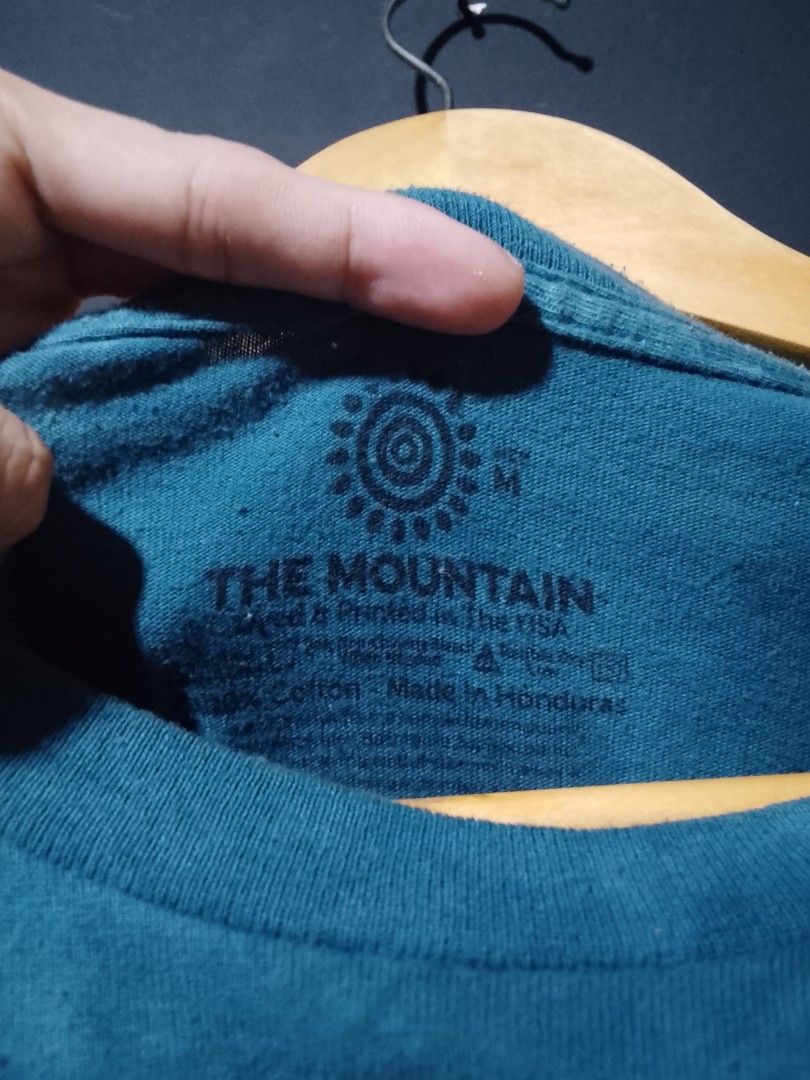 THE MOUNTAIN TEE (Category: Activewear) located in Talakag. Submitted by pang_uran (Listing ID 1461010393, Image 2). Description: 20 width 27 length very good condition 9.3 color rate 3rd generation the mountain(ANNE STOKE COLLECTION (.