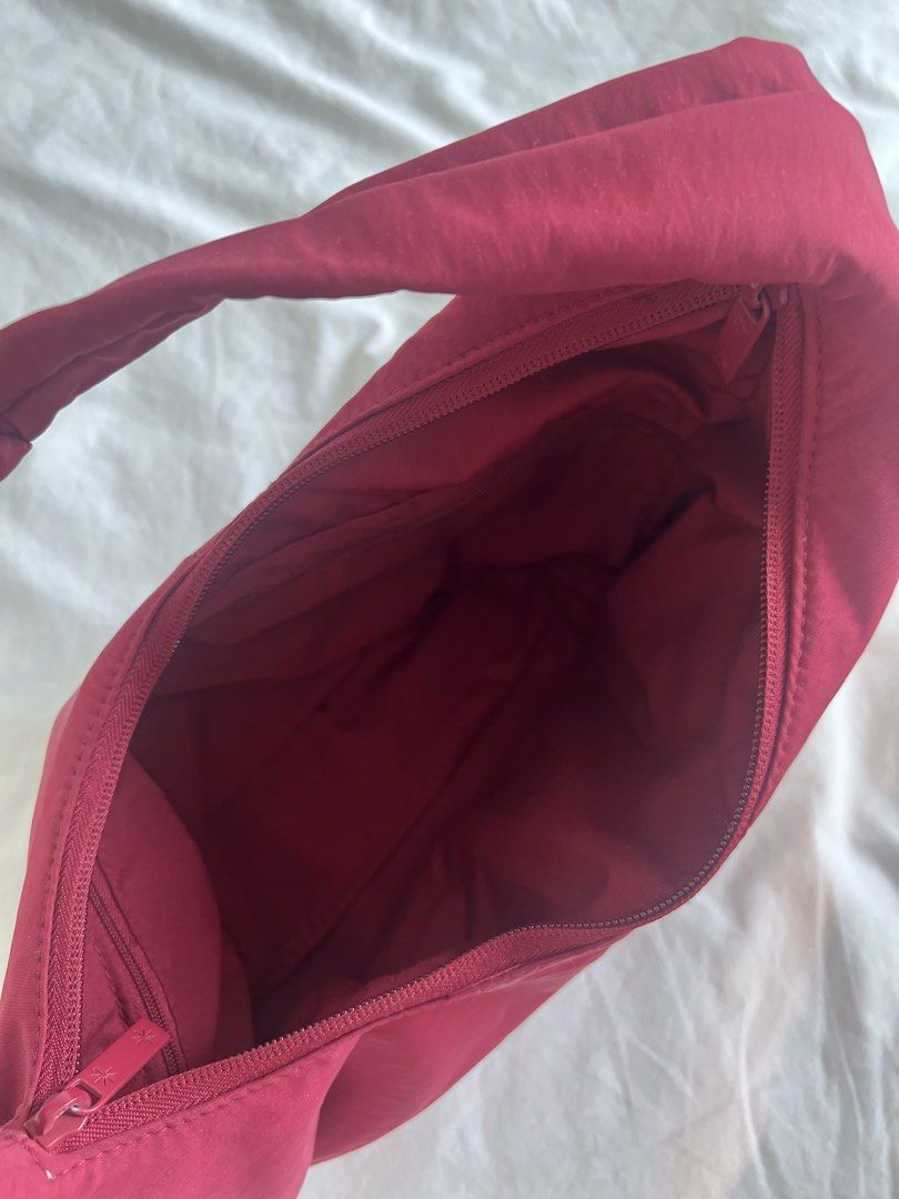 The Paper Bunny Mini Arc (Burgundy) (Category: Shoulder Bags) located in Makati City. Submitted by hereasysupply (Listing ID 1460964374, Image 3). Description: Blending style and functionality, the Mini Arc is a slouchy hobo-style bag that is compact enough to carry in your hand, yet spacious enough to hold all your essentials. PRODUCT DETAILS -Made with water-resistant nylon -Double zipper closure for convenient access no matter which side of yo