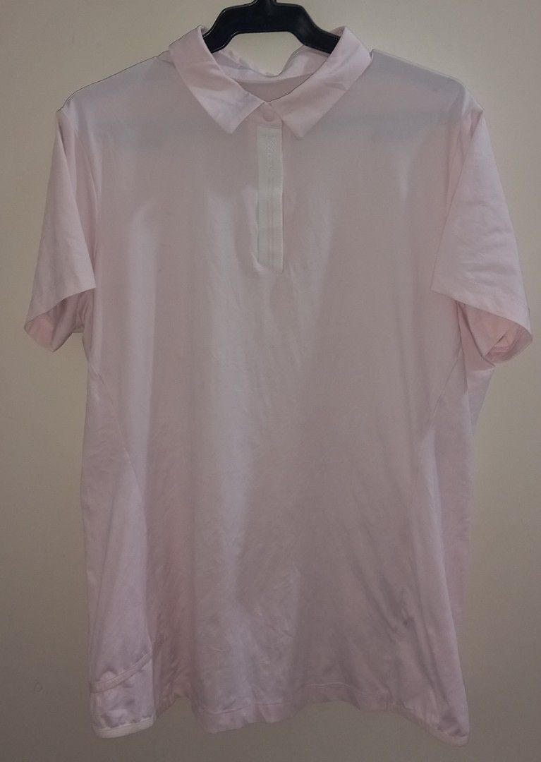 Titleist Pink Golf Shirt Size L (Category: Golf) located in Cagayan de Oro. Submitted by edwardryan01984 (Listing ID 1461048973, Image 1). Description: - Light pink Titleist golf shirt - Short sleeves with collared neckline and button placket - Made from a comfortable and flexible polyester/spandex blend - Ideal for golf or casual wear - Size: Large (L).