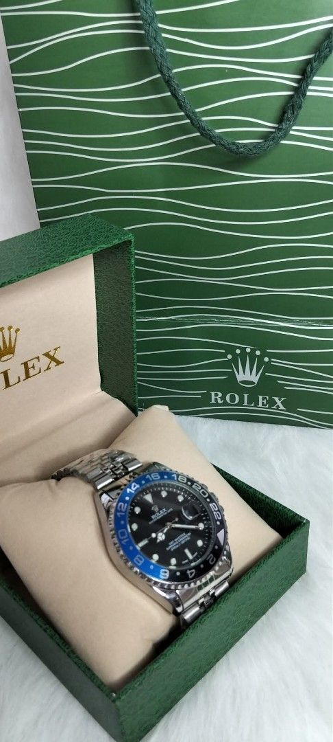 TOP G ( NO AUTOMATIC )QUARTZ (Category: Luxury Watches) located in Caloocan City. Submitted by annalle.20 (Listing ID 1461057045, Image 2). Description: Authentic Rolex GMT-Master II 'Pepsi' watch. Stainless steel. Includes original box and shopping bag. Perfect for collectors..