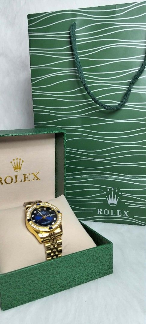 TOP G ( NO AUTOMATIC )QUARTZ (Category: Luxury Watches) located in Caloocan City. Submitted by annalle.20 (Listing ID 1461057045, Image 3). Description: Authentic Rolex GMT-Master II 'Pepsi' watch. Stainless steel. Includes original box and shopping bag. Perfect for collectors..