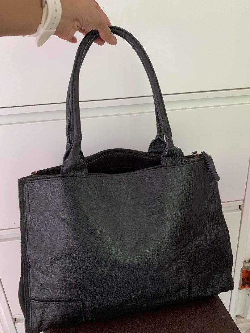 Tory Burch Black Leather Tote Bag (Category: Luxury Bags & Wallets) located in Taguig. Submitted by madisam (Listing ID 1460973029, Image 2). Description: Preloved original ToryBurch Combination of canvass leather Clear in pics Size height:12 inches Widht:15 inches .