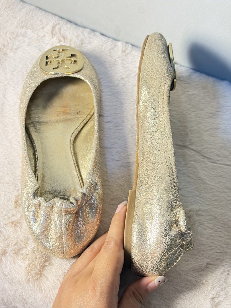 Tory Burch Gold Ballet Flat (Category: Sneakers & Footwear) located in Manila. Submitted by at_realty (Listing ID 1461074949, Image 1). Description: Authentic Tory Burch Size: 25cm Fits size 7 to 8 8/10 condition .