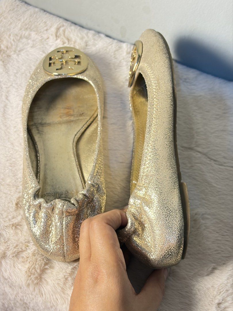 Tory Burch Gold Ballet Flat (Category: Sneakers & Footwear) located in Manila. Submitted by at_realty (Listing ID 1461074949, Image 2). Description: Authentic Tory Burch Size: 25cm Fits size 7 to 8 8/10 condition .