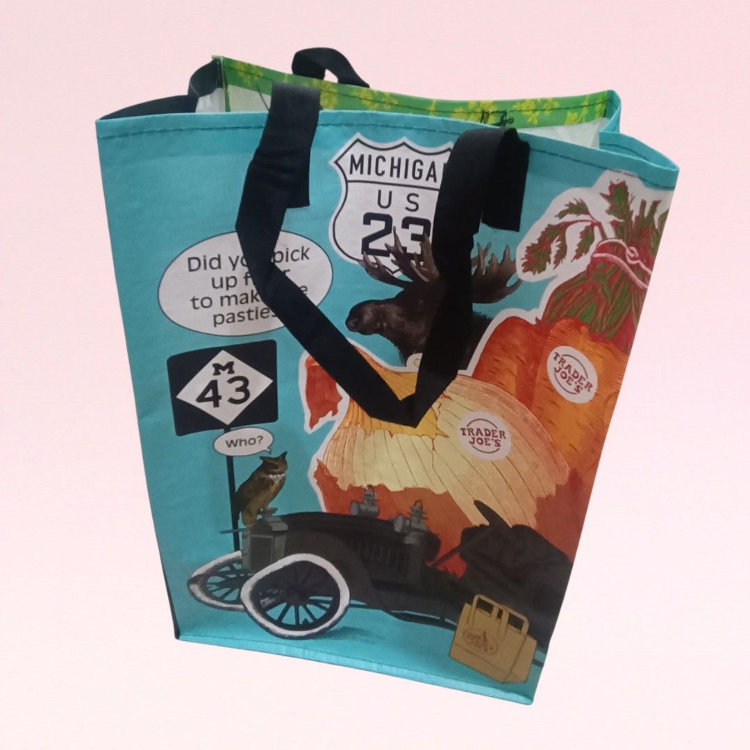 Trader Joe's MICHIGAN Reusable Bag (Category: Tote Bags) located in Quezon City. Submitted by firstlovedbyb (Listing ID 1460948685, Image 2). Description: *TRADER JOE'S RARE FIND!!!* Authentic Trader Joe's MICHIGAN 100% Reusable Polypropylene Bag. Ideal for grocery shopping, travel and outdoor activities. 6 gallon capacity. Dimensions: approx. 16.5 inches x 11.5 inches x 7 inches Price: 199 ✅ Brand new ✅ Available / On Hand ✅ Authentic ✅ Bought i