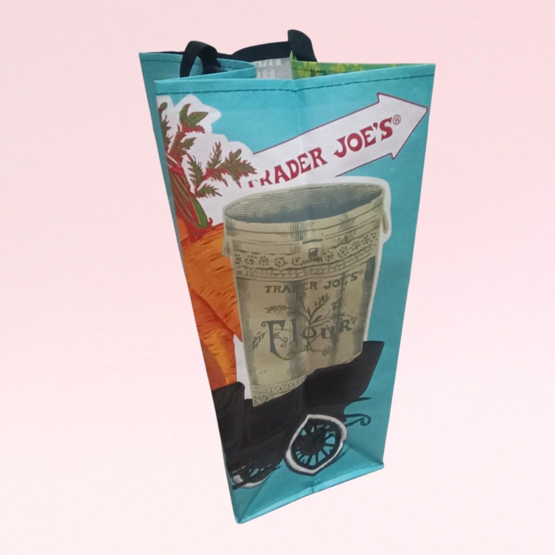 Trader Joe's MICHIGAN Reusable Bag (Category: Tote Bags) located in Quezon City. Submitted by firstlovedbyb (Listing ID 1460948685, Image 3). Description: *TRADER JOE'S RARE FIND!!!* Authentic Trader Joe's MICHIGAN 100% Reusable Polypropylene Bag. Ideal for grocery shopping, travel and outdoor activities. 6 gallon capacity. Dimensions: approx. 16.5 inches x 11.5 inches x 7 inches Price: 199 ✅ Brand new ✅ Available / On Hand ✅ Authentic ✅ Bought i
