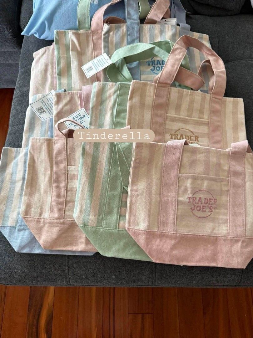 Trader Joe's tote bag USA🇺🇸 (Category: Tote Bags) located in Manila. Submitted by timelessthreads-8008 (Listing ID 1460959521, Image 1). Description: Trader Joe's USA🇺🇸 100% Guaranteed OG from CA USA Mini stripes summer edition Colors: Pale Pink Sky Blue Seafoam Green Desert Sand/Tan Size: 13"x 11" x 6" inches Php 600.