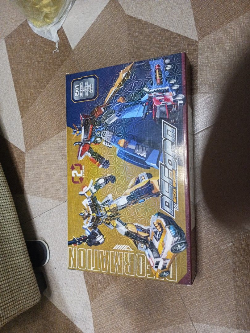 Transformers Set (Category: Action & Battle Toys) located in Tanza. Submitted by --unicorn-- (Listing ID 1461029334, Image 2). Description: - Deformation Series Mechanical Mecha Action Figure Set - Includes multiple transforming robots in one package - Perfect for collectors and kids who love transforming toys - Box showcases various robot designs and transformations - Provides hours of fun and imaginative play.