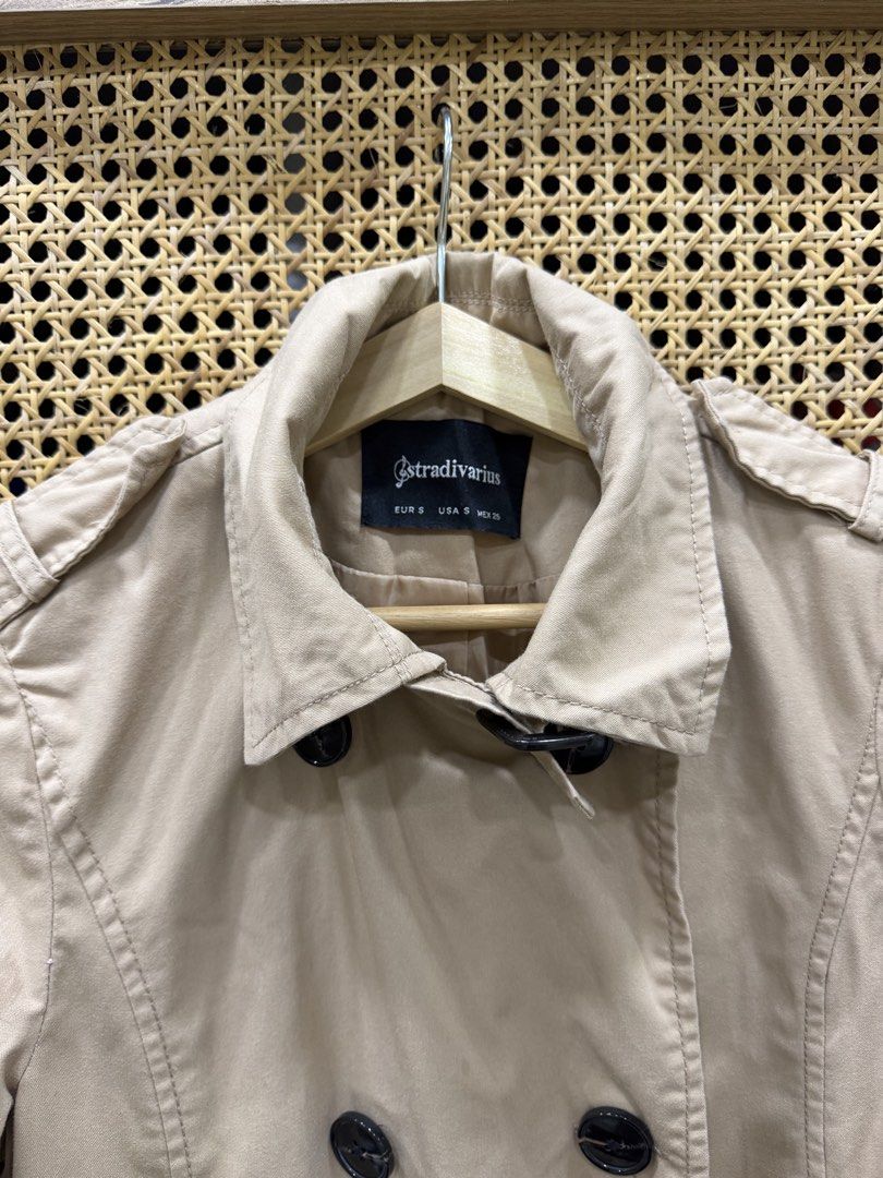 Stradivarius Trench Coat (Category: Coats, Jackets and Outerwear) located in Pasig City. Submitted by jgbeautique (Listing ID 1461066007, Image 3). Description: RCS: too small for me now Worn for a few times only. Almost as good as new. I am 5’2” for reference..