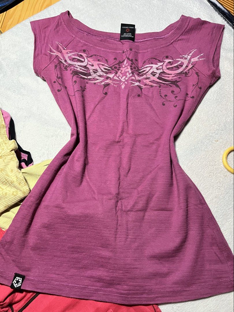 Tribal womens top (Category: Shirts) located in Manila. Submitted by eljayzz (Listing ID 1460951396, Image 3). Description: Berry Pink Tribal Scoop-Neck Top Color: Deep berry pink / magenta hue with slub-knit texture. Fabric & Size: 100% Cotton, Size Small. Design & Cut: Features a wide scoop neck, cap sleeves, and a fitted silhouette. with a small Tribal brand tag at the bottom hem. Pale Yellow Patterned Polo Shirt Color: Light cream / pale yell