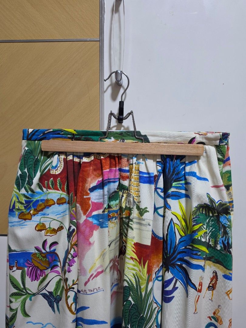 Tropical-Print Full Skirt (Category: Skirts) located in Makati City. Submitted by jengrace (Listing ID 1461065573, Image 2). Description: Original. Cotton material. No lining. Mid waist. Side pockets. Invisible side zip. Width: 15 in Length: 32.5 in Handled with care. Handwashed, never machine washed. RFS: Need closet space.