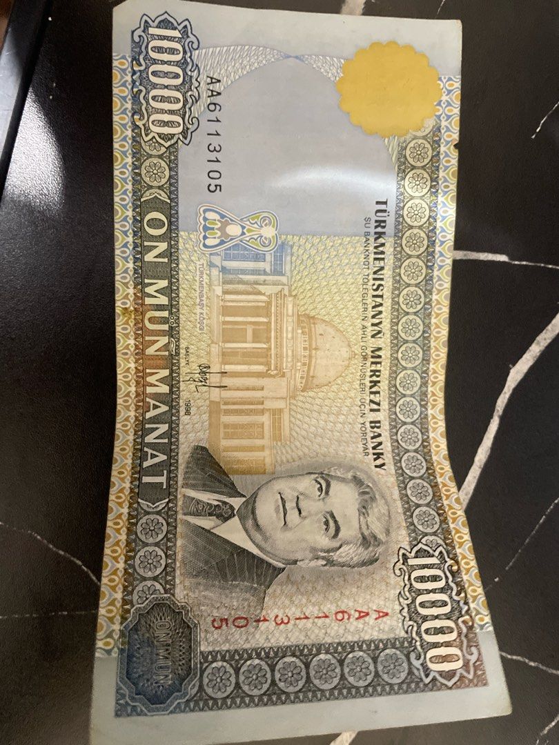 Turkmenistan 1000 Manat Banknote (Category: Currency) located in Manila. Submitted by mzzzxxxx.41 (Listing ID 1460940819, Image 1). Description: - Turkmenistan 1000 Manat banknote - Features the National Bank building on one side - Features a mosque on the other side - Visible serial number: AA6113105 - Ideal for banknote collectors - Makes a unique souvenir.
