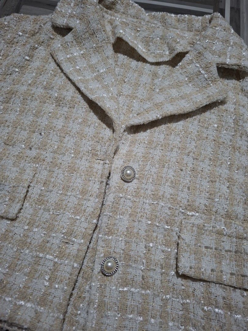 Tweed Crop Top, Blazer, and Shorts Set (Category: Sets or Coordinates) located in Cavite. Submitted by hermione.2000 (Listing ID 1461082183, Image 3). Description: - Cream and beige tweed set - Includes cropped cami top, structured blazer, and matching shorts - Blazer features elegant pearl button details - Perfect for a chic and sophisticated look - Worn only once for a special event.