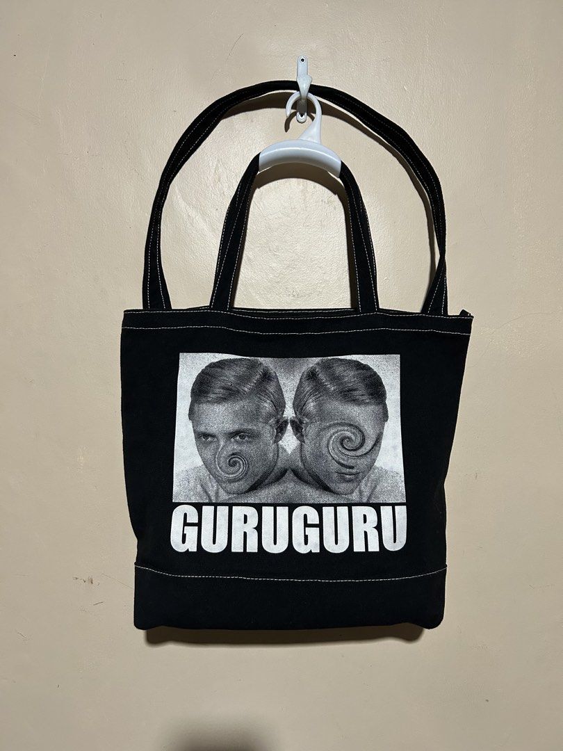 UNDERCOVER - FW06 “GURUGURU” TOTE BAG (Category: Sling Bags) located in Dasmarinas. Submitted by pseudonym. (Listing ID 1461059889, Image 2). Description: UNDERCOVER - “GURUGURU” TOTE BAG FROM FALL-WINTER 2006 SEASON EXCELLENT CONDITION NO FLAWS feel free to inquire quick replies .