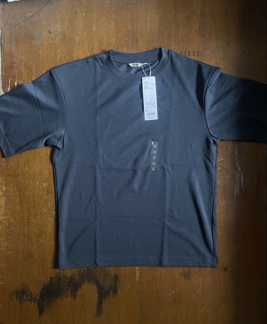 Uniqlo Airism (Navy) (Category: Tshirts & Polo Shirts ) located in Pasig City. Submitted by marcuswha (Listing ID 1460986794, Image 1). Description: brandnew with tag ₱790 srp.