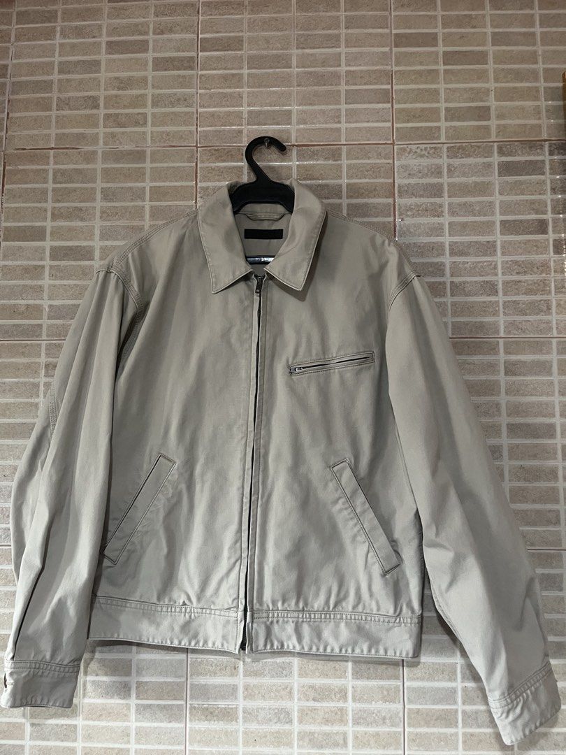Uniqlo Beige Harrington Jacket (Category: Coats, Jackets and Outerwear) located in Taguig. Submitted by realiam (Listing ID 1460963699, Image 1). Description: - Uniqlo Blouson Jacket - Beige - Size: Small - Issue: Small stains from ironing in arm area. See pics +sf taguig loc .