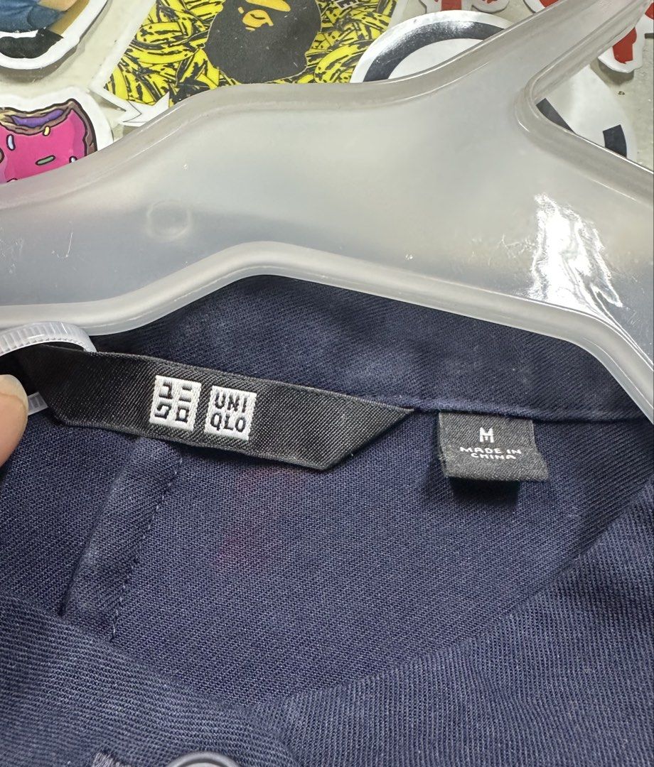 UNIQLO BLOUSE (Category: Blouses) located in Subic. Submitted by stuffs_online (Listing ID 1461008287, Image 2). Description: UNIQLO SHORT SLEEVE BLOUSE dark blue in actual LIKE NEW M ON TAG P 280 fix.