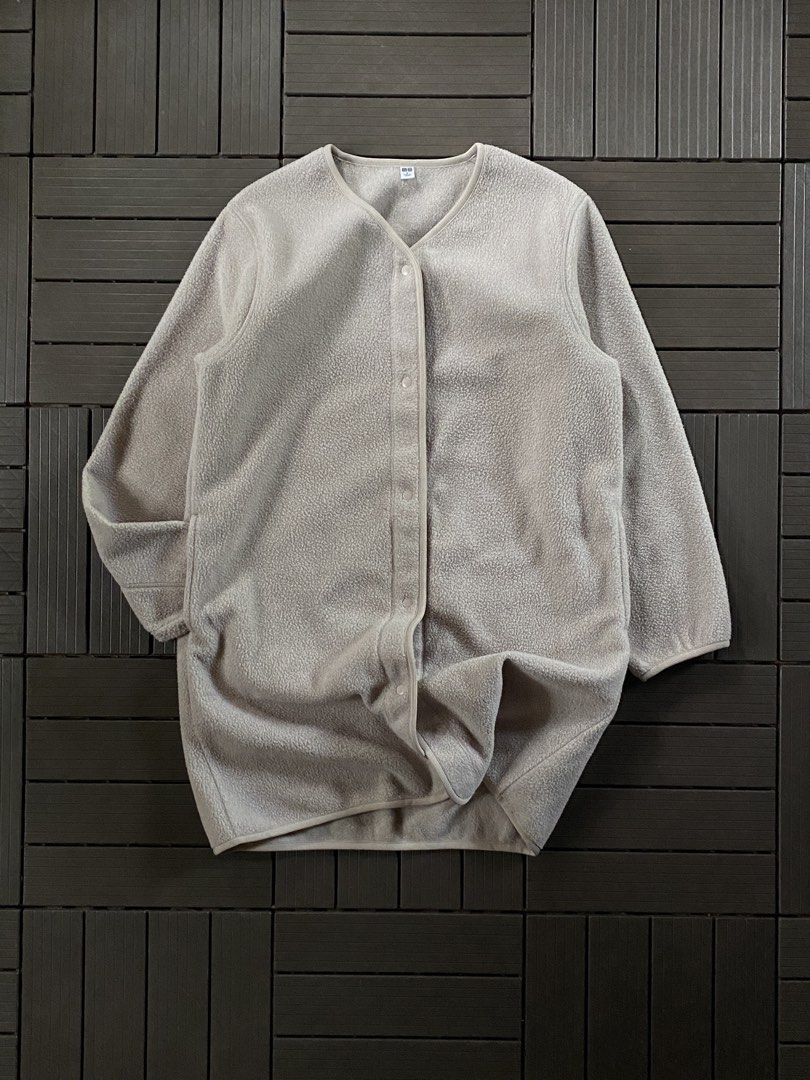 Uniqlo Fleece Button Up Jacket Size M (Category: Coats, Jackets and Outerwear) located in Puerto Princesa. Submitted by streetnfinds (Listing ID 1461073575, Image 1). Description: Length: 31" Width: 20" Sleeve Length: 21" Medium-Large - Uniqlo Fleece Jacket - Color: Light Beige/Grey - Style: Button-up V-neck - Material: Soft and cozy fleece - Features: Great for layering - Size: Medium (M) - Origin: Made in China.