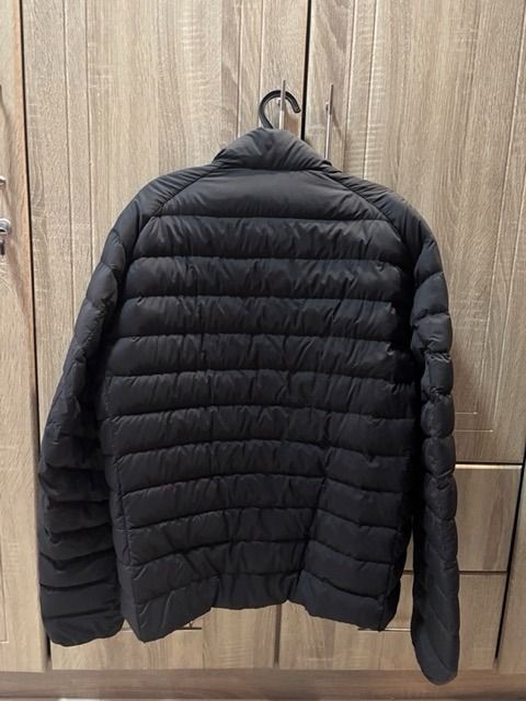 Uniqlo Puffer Jacket - Black (Category: Coats, Jackets and Outerwear) located in Bulacan. Submitted by pjdeclutters (Listing ID 1460968604, Image 2). Description: selling for ₱1,300 bought for ₱2,990 size L lightweight packable nylon used 2-3x Payment: GCash | Bank Transfer Shipping: J&T. SF handled by buyer Location: Meycauayan, Bulacan For Reference Height: 5'10 Weight: 70kg Waist: 30-31in.