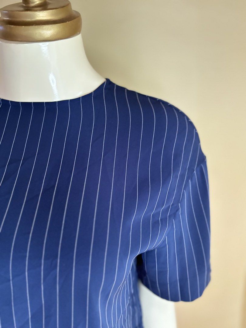 Uniqlo Striped Blouse (Category: Blouses) located in Silang. Submitted by princess_ameerah (Listing ID 1461003519, Image 2). Description: Uniqlo Striped Blouse - Small on tag -Condition 10/10 -Color may vary due to lighting Location:Cavite Shipping via J&T Mode of payment: Gcash,BPI & Maribank 250.