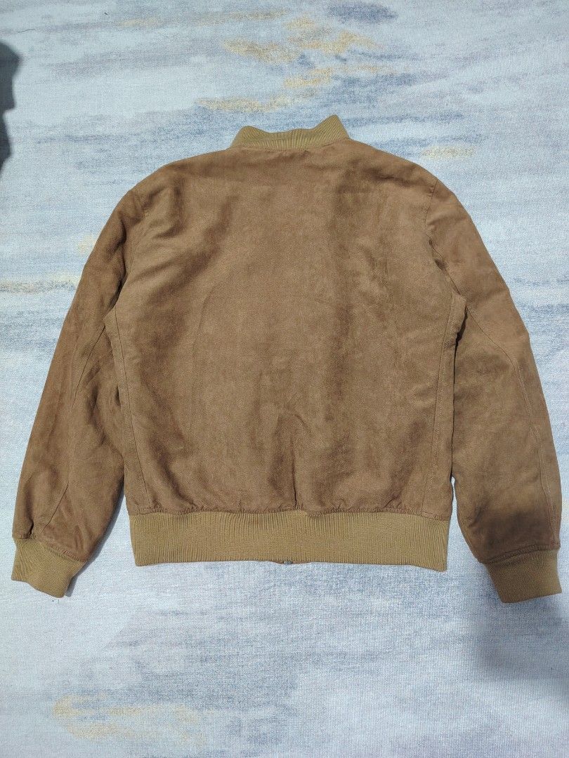 UNIQLO SUEDE BOMBER JACKET (Category: Coats, Jackets and Outerwear) located in Dagupan City. Submitted by gandita.28 (Listing ID 1461046996, Image 2). Description: UNIQLO FAUX SUEDE BOMBER JACKET YKK ZIP MEDIUM ON TAG DARK BROWN ACTUAL COLOR ( COLOR MAY VARY DUE TO LIGHTING) EXCELLENT CONDITION.