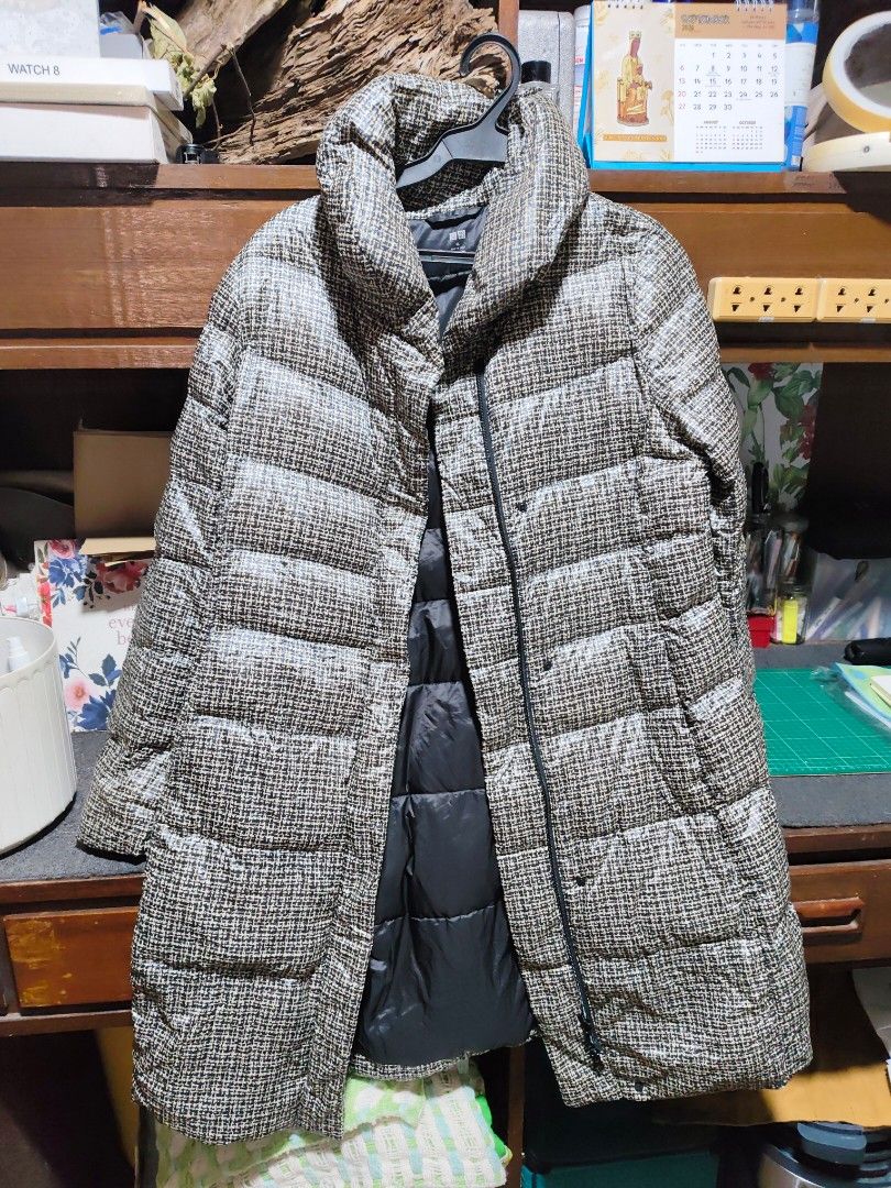 Uniqlo Women's Patterned Down Jacket XL (Category: Coats, Jackets and Outerwear) located in Manila. Submitted by bsemcfran19535 (Listing ID 1460975269, Image 1). Description: - Uniqlo Women's Down Jacket - Size: XL - Color/Pattern: Subtle and stylish pattern - Features: Zipper closure, inner pockets - Function: Excellent for keeping warm - Origin: Made in China - Condition: Please check photos for details.