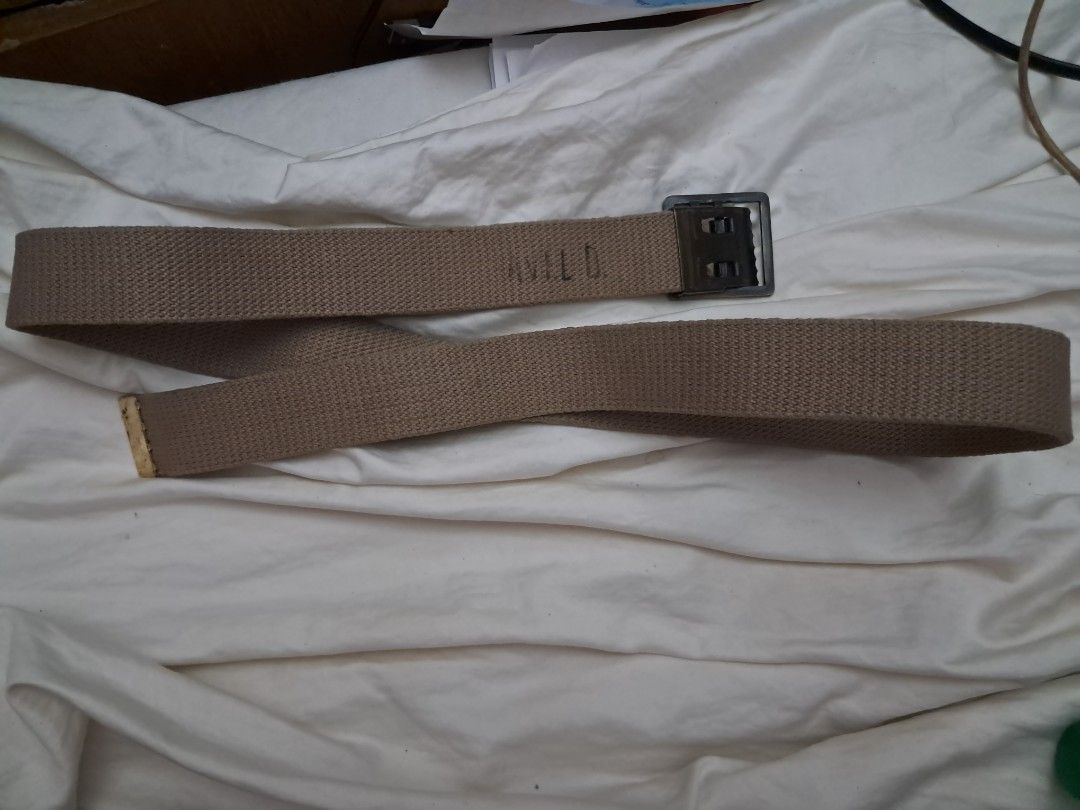 U.s military belt & buckle (Category: Belts) located in Davao. Submitted by rbjuvyreyn18879 (Listing ID 1461114227, Image 2). Description: - Adjustable tan canvas belt - Woven canvas texture - Matte finish metal buckle - Some markings on canvas (possibly initials) - Practical and versatile accessory - buckle made of brass.rust proof - 100 cm long.