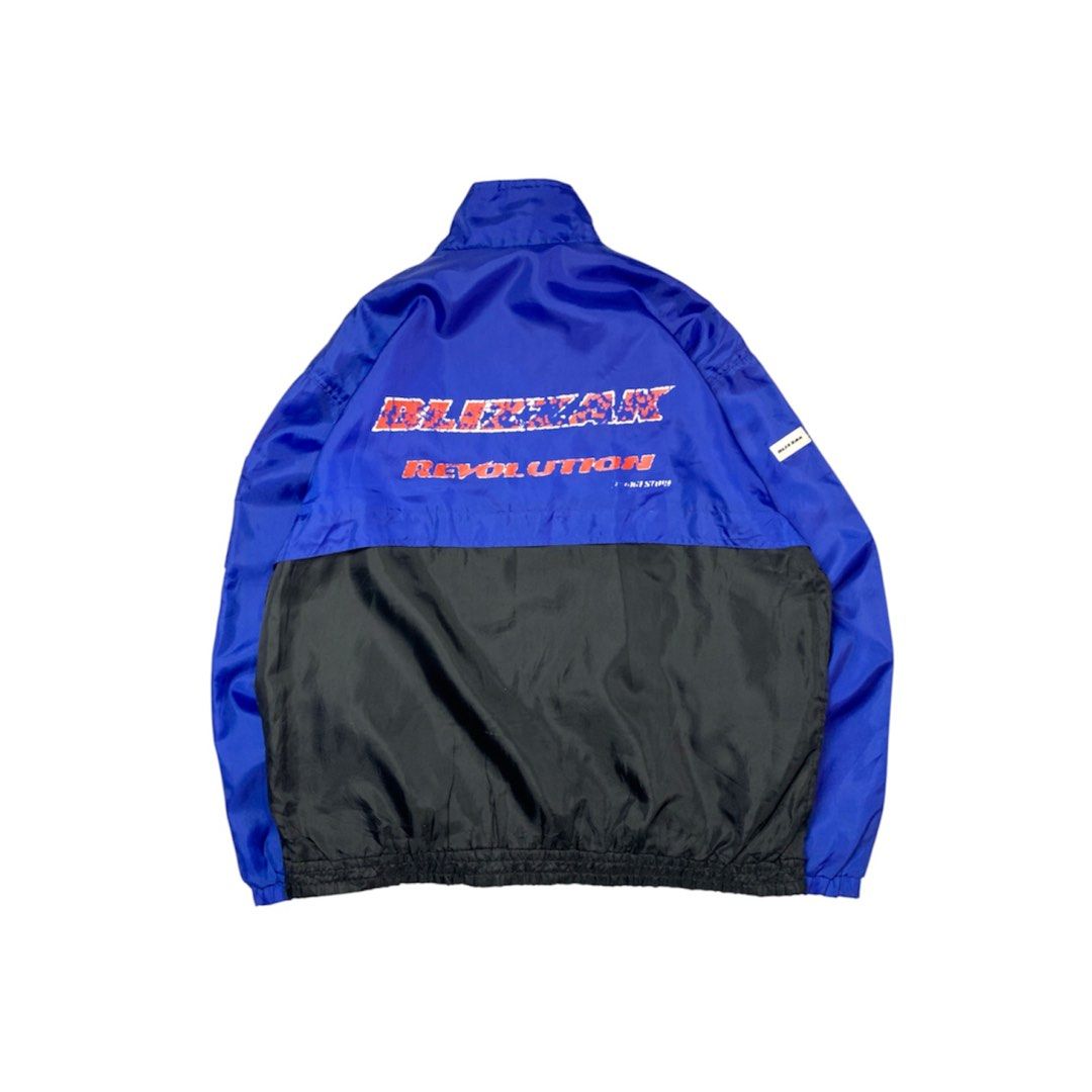 Vintage Blizzak Revolution Racing Windbreaker (Category: Coats, Jackets and Outerwear) located in Baguio. Submitted by been.aged_ph (Listing ID 1460975613, Image 1). Description: 𝚂𝚒𝚣𝚎: fits up to 2XL 𝙳𝚒𝚖𝚎𝚗𝚜𝚒𝚘𝚗𝚜: 26 x 29 𝙲𝚘𝚗𝚍𝚒𝚝𝚒𝚘𝚗: Good 𝙸𝚜𝚜𝚞𝚎: prints (see photos for reference) Model Height: 5' 7" .