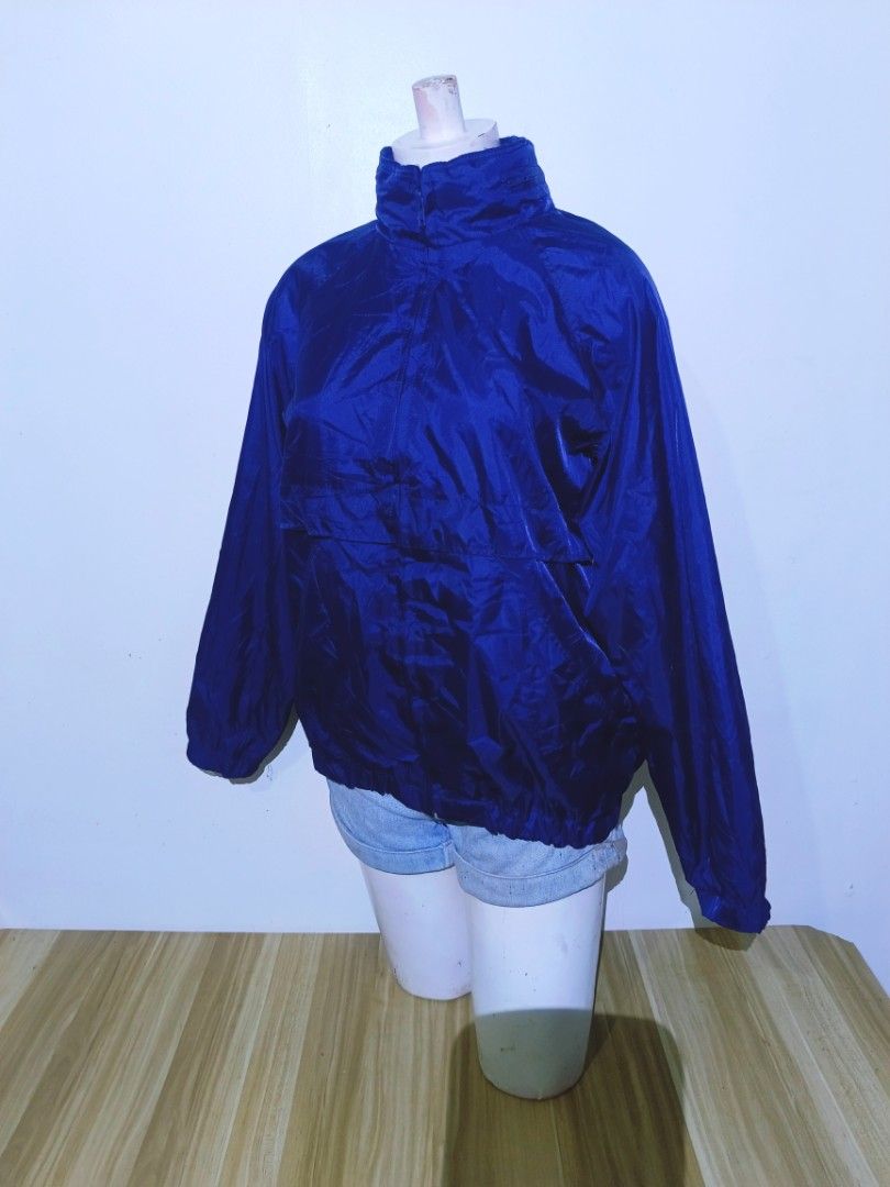 VINTAGE Currentseen Blue Windbreaker Jacket M/M (Category: Coats, Jackets and Outerwear) located in Bayambang. Submitted by meowww1819 (Listing ID 1461072612, Image 2). Description: - Brand: Currentseen - Type: Blue Windbreaker Jacket - Size: M - Origin: Made in Russia - Features: Quarter zip, stand-up collar, large front pocket - Material: Lightweight, ideal for layering - Best for: Casual wear, outdoor activities.