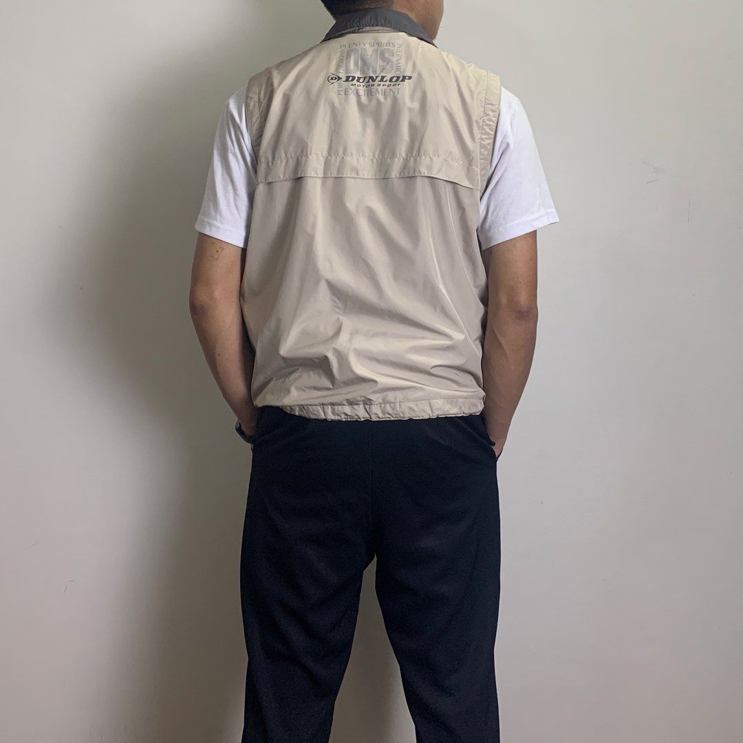 Vintage Dunlop Motorsport Vest (Category: Vests) located in Baguio. Submitted by been.aged_ph (Listing ID 1460972727, Image 3). Description: 𝚂𝚒𝚣𝚎: fits up to M 𝙳𝚒𝚖𝚎𝚗𝚜𝚒𝚘𝚗𝚜: 22 x 25.5 𝙲𝚘𝚗𝚍𝚒𝚝𝚒𝚘𝚗: Excellent 𝙸𝚜𝚜𝚞𝚎: pinhole & small stains (see last photo for reference) Model Height: 5' 7" .
