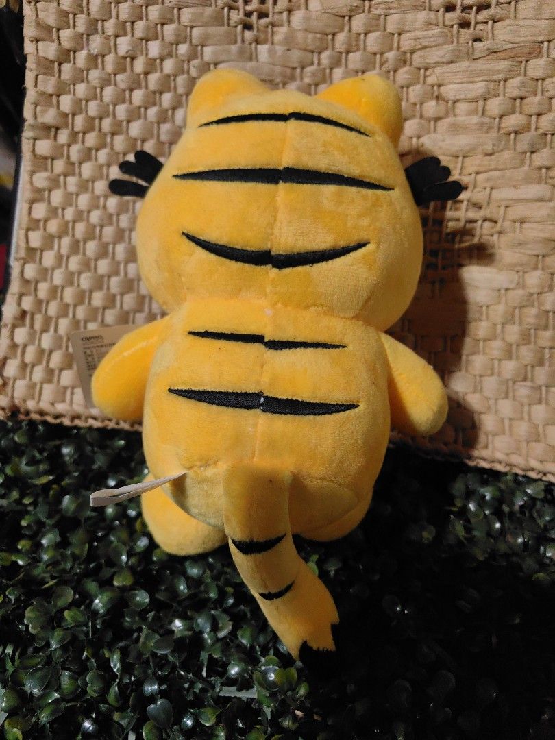 Vintage Garfield plush toy (Category: Plushies & Soft Toys) located in Calamba. Submitted by princesspauliney. (Listing ID 1461051061, Image 3). Description: Character: Garfield the Cat Brand/Manufacturer: GOSH International (Licensed under PAWS) Approximate Release Year: 2001 Features: Half-lidded expression, a round plush pink nose, soft fabric construction, and an attached character hang tag..