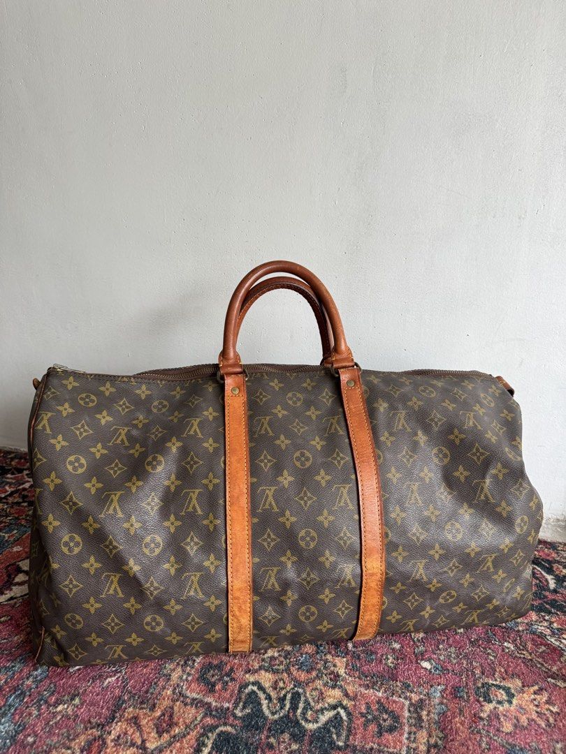 vintage Louis Vuitton Monogram Keepall duffel (Category: Luxury Bags & Wallets) located in Quezon City. Submitted by streetgallerygarments (Listing ID 1460973864, Image 2). Description: vintage Louis Vuitton Monogram Keepall duffel travel bag featuring the classic brown canvas and tan leather trim Condition:RANK AB Courier Jnt/Lbc Dhl express.