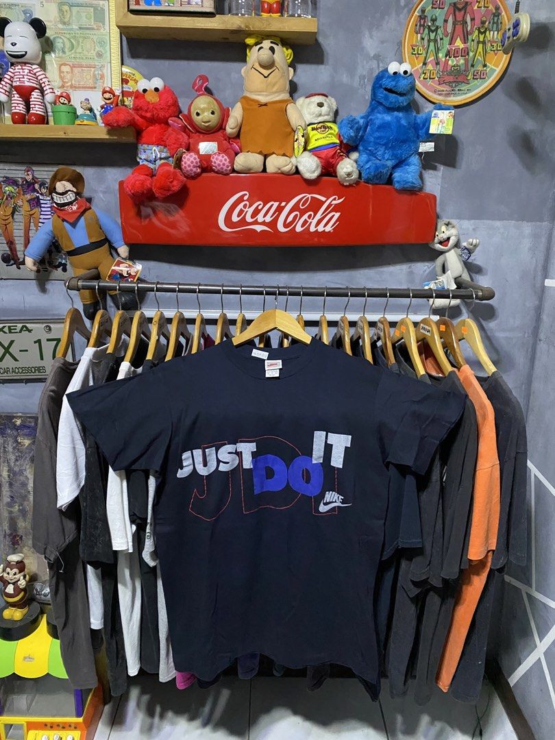 Vintage Nike Just Do It T-Shirt (Category: Tshirts & Polo Shirts ) located in Santa Ana. Submitted by tunes_vtg (Listing ID 1461035568, Image 1). Description: - Vintage Nike Single stitch - Features iconic 'Just Do It' graphic in grey and blue - Made in USA - Size M - Great for casual wear or workouts - Shows some signs of wear, but plenty of life left - A must-have for Nike fans - Excellent condition - No issues - Size M fit to L - Dimes:L29xW21