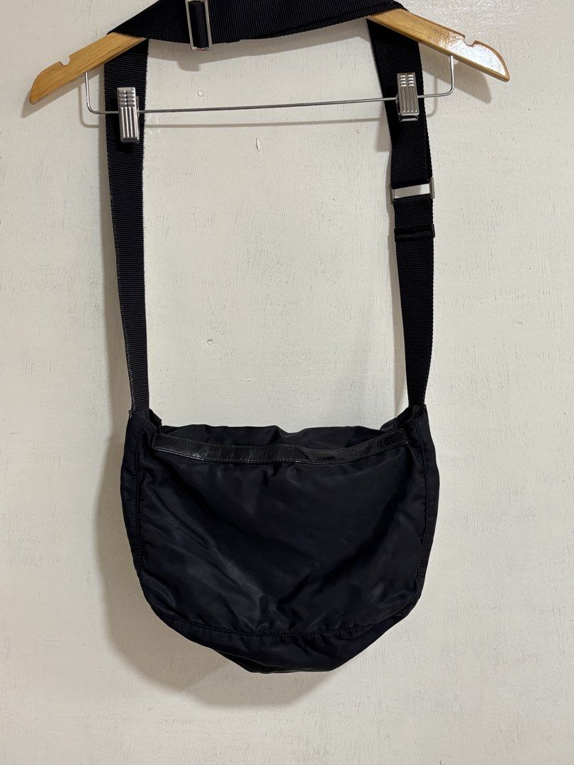 Vintage Prada Nylon Messenger Bag (Category: Sling Bags) located in Naga. Submitted by unknwnstreetwear (Listing ID 1461025959, Image 2). Description: VERY GOOD CONDITION WIDTH-10.5 INCHES LENGTH-11 INCHES .
