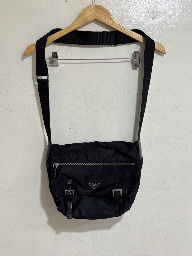 Vintage Prada Nylon Messenger Bag (Category: Sling Bags) located in Naga. Submitted by unknwnstreetwear (Listing ID 1461025959, Image 1). Description: VERY GOOD CONDITION WIDTH-10.5 INCHES LENGTH-11 INCHES .