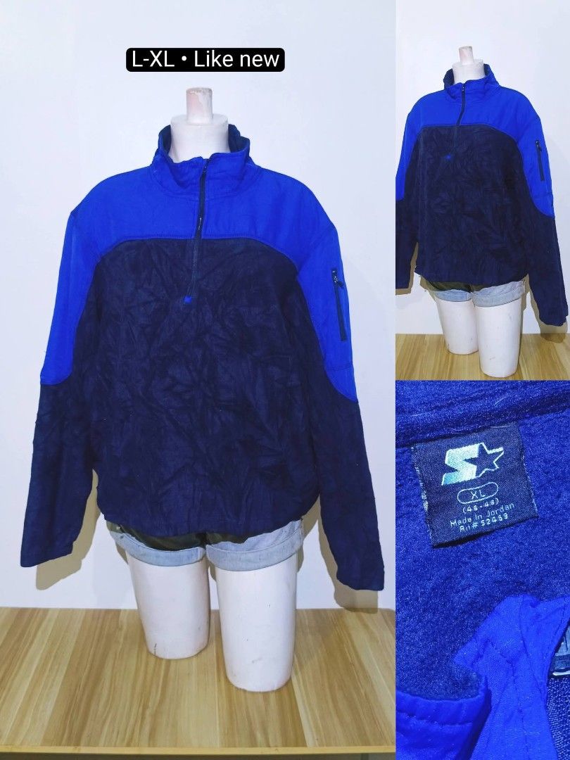 Vintage Starter Blue & Navy Blue Pullover Jacket XL (Category: Luxury Apparel) located in Bayambang. Submitted by meowww1819 (Listing ID 1461078915, Image 1). Description: - Starter brand pullover jacket - Two-tone blue and navy design - Zip-up neck - Zippered side pocket - Made in Jordan - Size XL - Ideal for casual wear or outdoor activities.