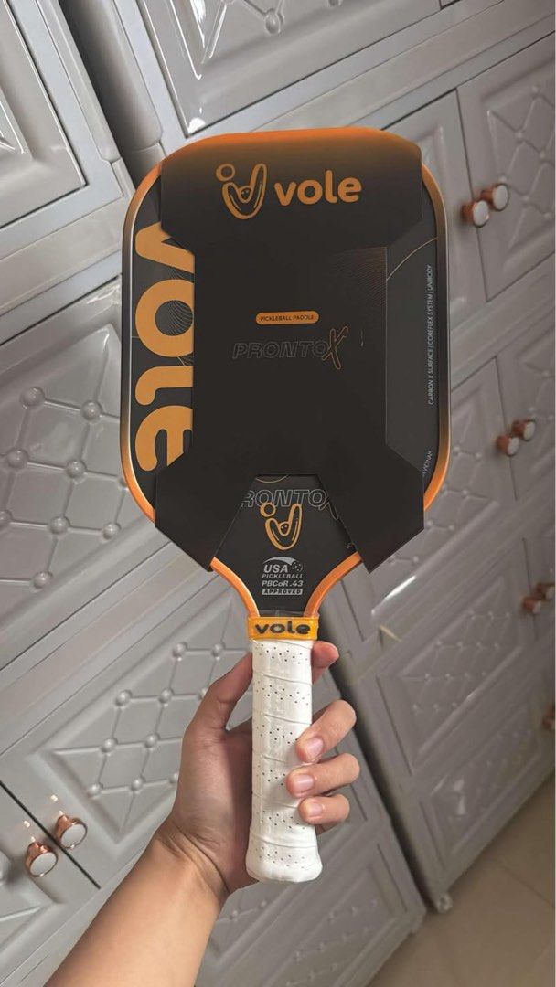 Vole Pronto X Pickleball Paddle - Multiple Colors Available (Category: Racket and Ball Sports) located in San Pedro. Submitted by _apol_ (Listing ID 1461052065, Image 3). Description: Brand New - Vole Pronto X Pickleball Paddles - Suitable for players of all levels - Durable carbon surface - Comfortable grip for extended play - Available colors: Black, Pink, Orange, Green Inclusions: PPF clear edge guard, grip tape .