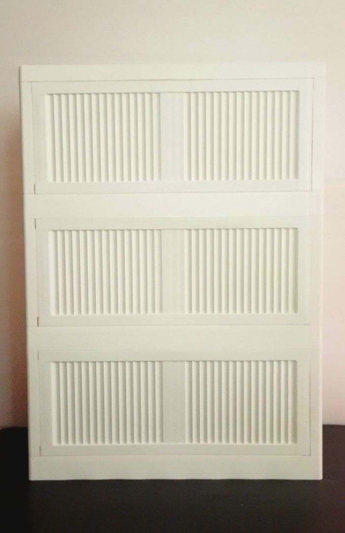 White 3-Tier Storage Cabinet (Category: Shelves, Cabinets & Racks) located in Pasig City. Submitted by kuhkuh (Listing ID 1460955358, Image 3). Description: White storage cabinet (3-tier) Short-time used (used as display rack only) 💕Bought in Shopé Php 812. 🎈Now sells @ 700. - Features a ribbed design on the drawer fronts - Equipped with stylish wooden-like handles - Ideal for organizing clothes, toys, or general household items - Smooth and ea