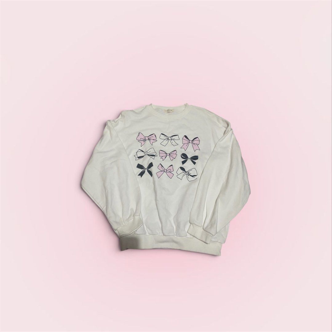 White Bow Sweater | Y2K, Babydoll, Coquette (Category: Coats, Jackets and Outerwear) located in Manila. Submitted by mxnlessandra (Listing ID 1461024606, Image 1). Description: Dimensions: 20.5 (chest width) x 22 (length) x 17 (sleeves) Size 13 on Tag Needs wash — MOP: GCash only — MOD: J&T or Lalamove — DF c/o of buyer — Location: Baguio City .