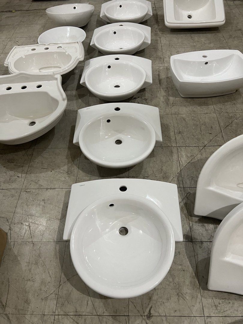 White Ceramic Bathroom Sinks - Various Styles Available (Category: Bathroom & Kitchen Fixtures) located in Manila. Submitted by icarux995387 (Listing ID 1461060519, Image 3). Description: - White ceramic bathroom sinks available - Variety of shapes and sizes, including pedestal and wall-mounted options - Made from durable ceramic material - Ideal for bathroom renovations or new construction projects - Contact seller for details on individual sink