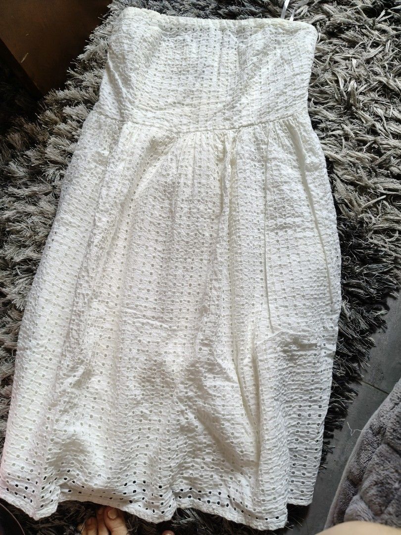 White Eyelet Strapless Smocked Midi Dress (Category: Dresses) located in Tarlac. Submitted by momma02 (Listing ID 1460937006, Image 2). Description: - White strapless midi dress - Smocked bodice for a comfortable fit - Textured eyelet fabric - Scalloped eyelet hem detail - Ideal for summer occasions and beach getaways - Easy to wear and style -slight marks due to storage but can be washed used once.