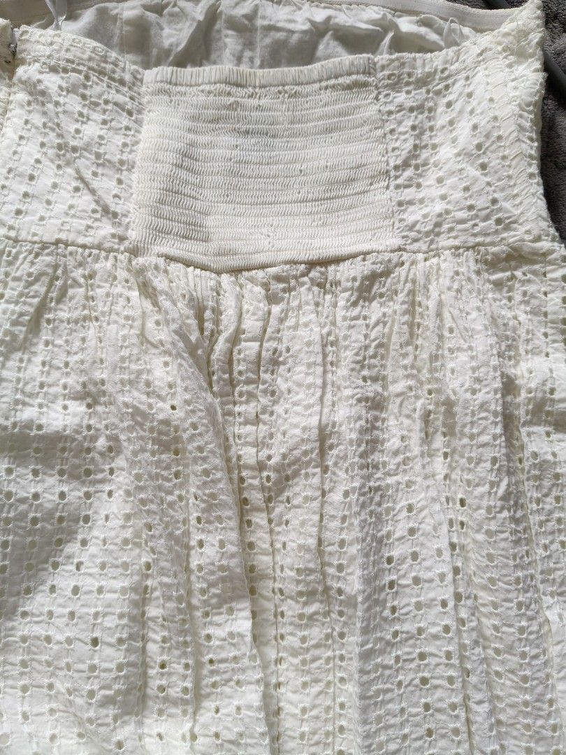 White Eyelet Strapless Smocked Midi Dress (Category: Dresses) located in Tarlac. Submitted by momma02 (Listing ID 1460937006, Image 3). Description: - White strapless midi dress - Smocked bodice for a comfortable fit - Textured eyelet fabric - Scalloped eyelet hem detail - Ideal for summer occasions and beach getaways - Easy to wear and style -slight marks due to storage but can be washed used once.