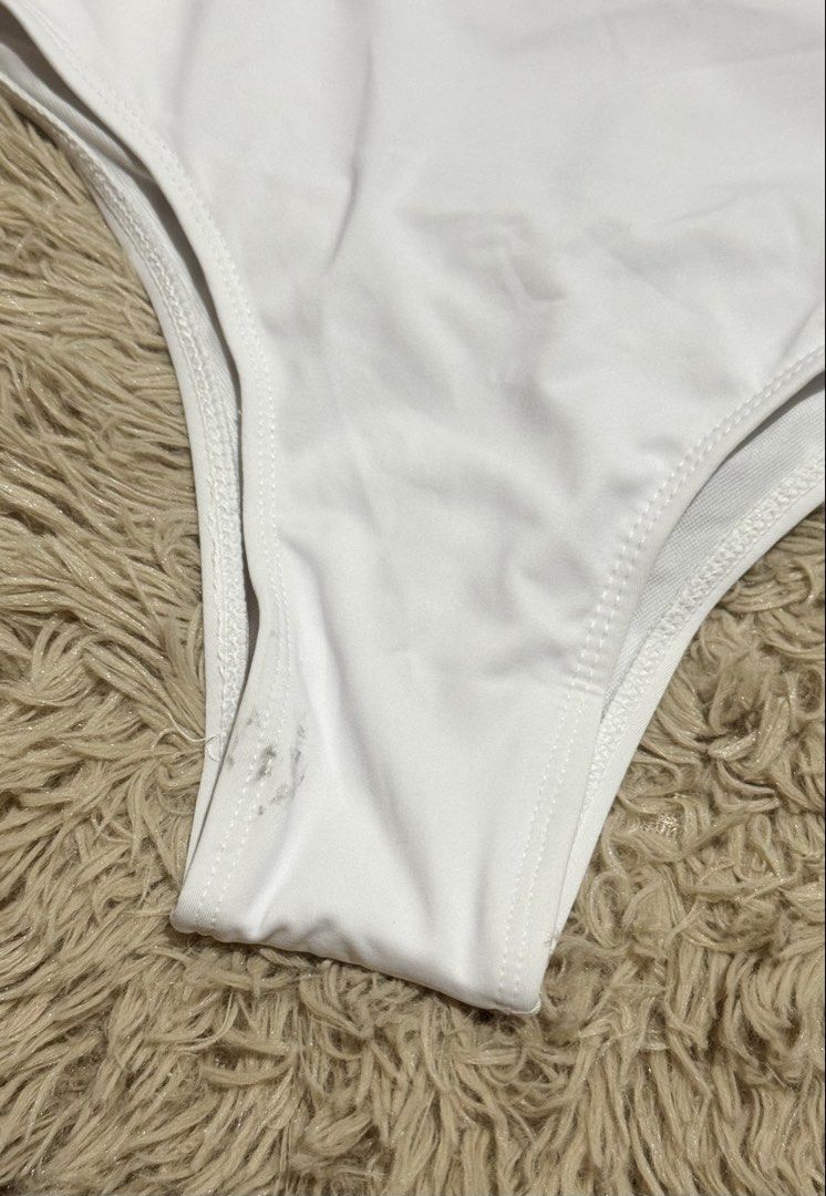 White One-Shoulder Swimsuit (Category: Bikinis & Swimsuits) located in Quezon City. Submitted by dearpretty.ph (Listing ID 1461045999, Image 3). Description: XS-Small size S on tag Camera used: iPhone 15 Pro Max Colors may slightly vary due to lighting.