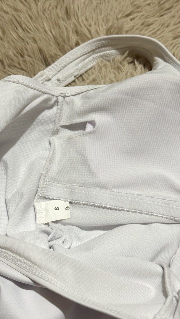 White One-Shoulder Swimsuit (Category: Bikinis & Swimsuits) located in Quezon City. Submitted by dearpretty.ph (Listing ID 1461045999, Image 2). Description: XS-Small size S on tag Camera used: iPhone 15 Pro Max Colors may slightly vary due to lighting.