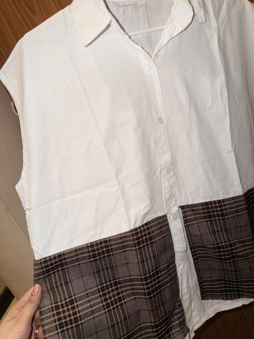 White Sleeveless Shirt with Plaid Bottom (Category: Shirts) located in Caloocan City. Submitted by jonaliemae09842 (Listing ID 1461095812, Image 3). Description: - White sleeveless shirt - Plaid panel detail at the bottom - Button-up front - Perfect for layering or wearing alone - Easy to style for various looks Up to XL.