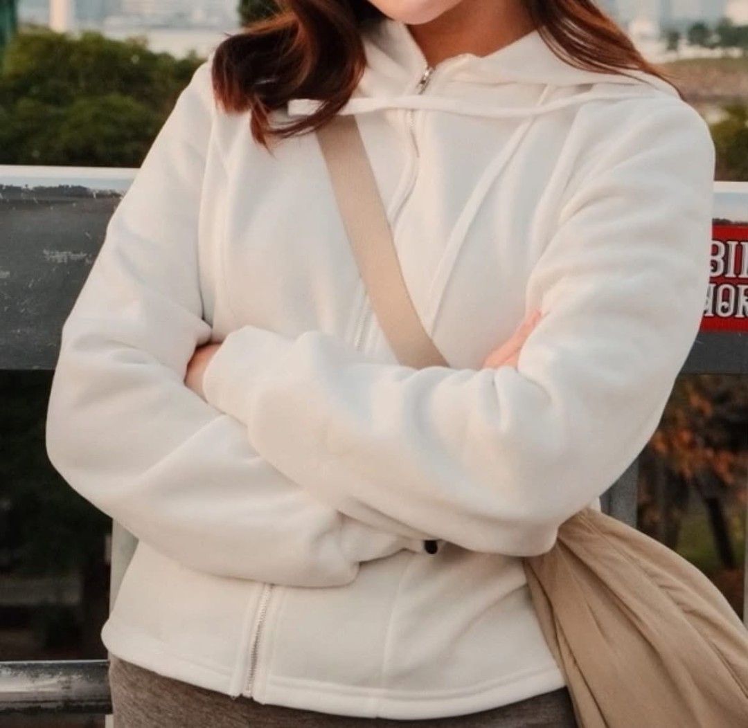 White Zip-Up Hoodie (Category: Coats, Jackets and Outerwear) located in Manila. Submitted by renznrs (Listing ID 1461078811, Image 3). Description: - White zip-up hoodie - Size Large - Worn only once - No issues, looks brand new - Ideal for casual wear.