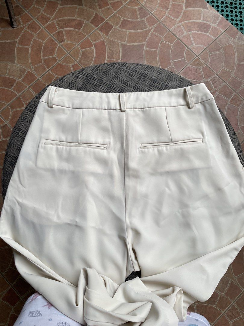 wide leg trousers (Category: Other Bottoms) located in Antipolo. Submitted by eferdzx (Listing ID 1453041475, Image 3). Description: 1 issue: hook needs stitching - waistline: 25 inches - length: 99 cm - Beige wide leg trousers - Brand: Elf Sack - High-waisted design.